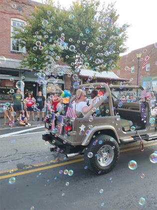 Bubbles were in abundance from an Ellijay Jeepers entry in the Independence Day evening parade. (Photo by Mark Millican)