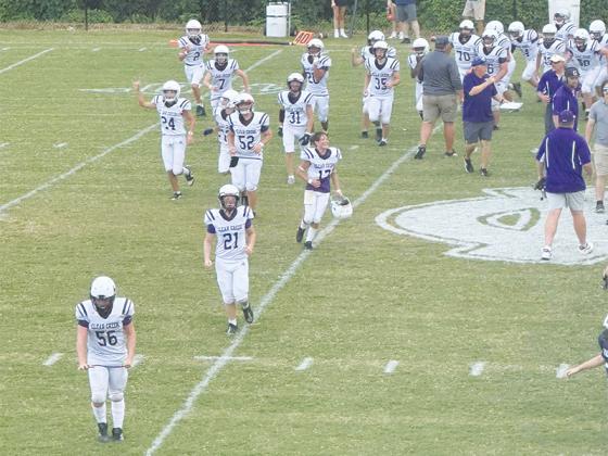 Clear Creek eighth graders leave the field in celebration last Wednesday at White County.