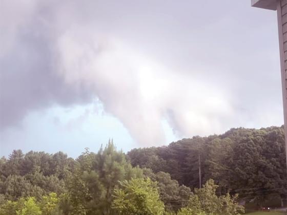 Marea McIntosh posted this photo and others on the “Ellijay Life” Facebook page and remarked, “(I) saw the two funnel clouds forming at the beginning of (the July 30) storm shortly before we lost power. Holden Road (off Old Highway 5 South) has several trees down and power lines down on the road.” (Contributed photo)
