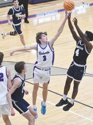 Ryder Wofford blocks a shot during his senior season at GHS and will attend Reinhardt University.