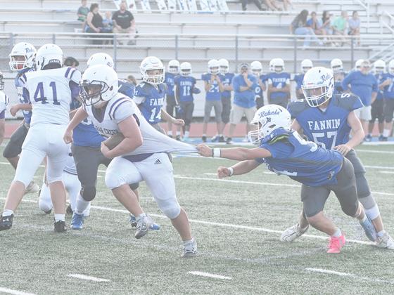 Clear Creek’s Cal Morrison breaks a tackle earlier this season versus Fannin County, and he broke an 80-yard touchdown run last Wednesday versus Union County.