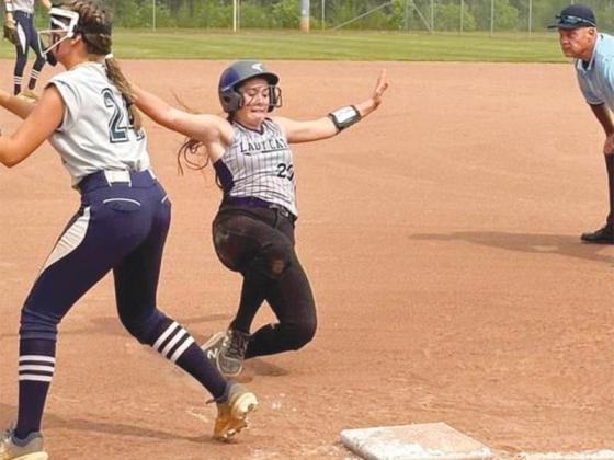 Clear Creek’s Neeyah McDaniel slides safely into third base and hit a triple and two doubles versus Union County.