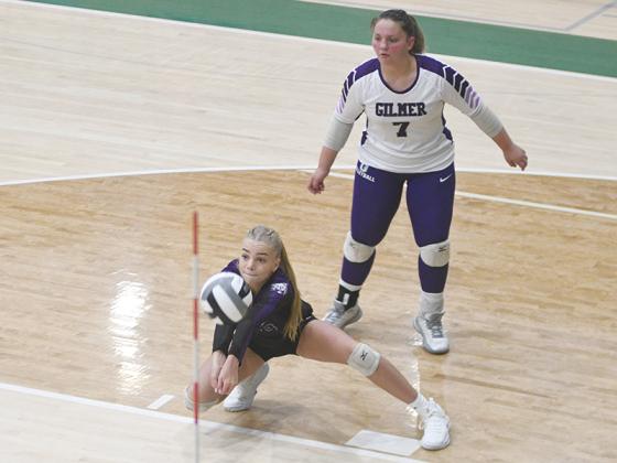 Gilmer’s Jace Sanderson is backed up by libero Maddie Usry (7). Sanderson had seven kills, five assists and five digs in the Cats’ win over Adairsville and Usry provided 21 digs. 