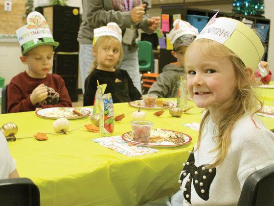Easton Daniels, Zella Watkins and Ziggy Bailey enjoyed fruit and popcorn in Bobbi Leigh Mullins’ class.