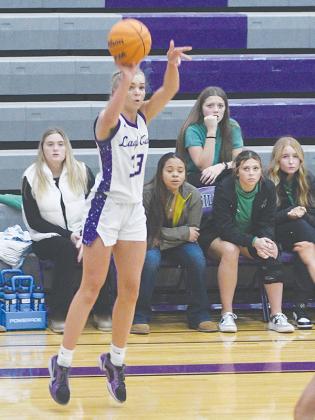 Gilmer High sophomore Jace Sanderson shoots a three pointer against Murray County last Thursday and made six threes versus West Forsyth two days later.