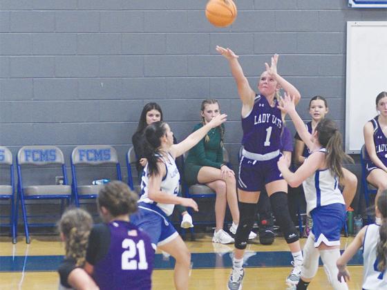 Clear Creek’s Braley Stewart fires a three pointer and scored all nine of the Lady Cats’ fourth quarter points in their win over Fannin County.