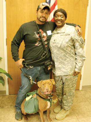 Samuel and Nikisha Melendez were featured in Apple Capital 2024, a magazine of the Times-Courier newspaper in Ellijay, in a story about Shelter Dogs for Veterans. Here they are pictured at the annual free Veterans Day breakfast sponsored by Ellijay First UMC. Nikisha was the Grand Marshal of the parade and also the keynote speaker. Their shelter dog Loki is in training.