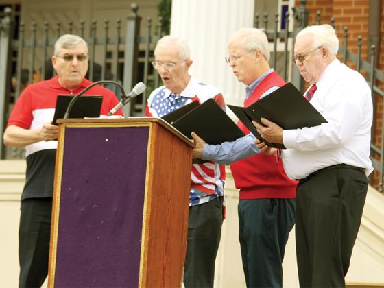The Pleasant Grove Men’s Quartet rendered a patriotic song at Veterans Day festivities on the square. From left are Scott Adamavage, Loy Jarrett, Doug Lee and Charles Moody. A former pastor of the Baptist church and Vietnam veteran, Rubin Smith, gave an invocation.