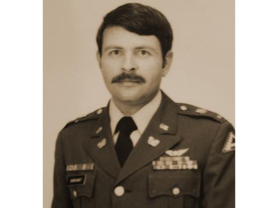 Warrant Officer 2nd Class Joe Burkhardt in his dress uniform. He retired from the Army as a Chief Warrant Officer 4th Class after 23 years of service. 