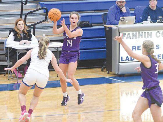 Gilmer Lady Cat Bree Burnette (14) runs the fast break versus Fannin County and passes to teammate Jace Sanderson (33).