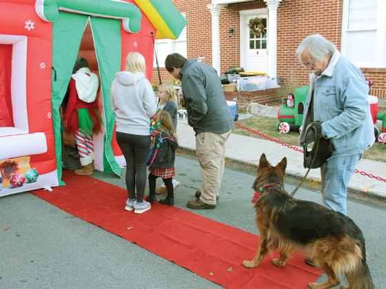 The Santa House was a popular venue during Light Up Ellijay, with the purchase of photos with Santa and Ms. Claus benefiting Friends of Gilmer Animal Shelter.