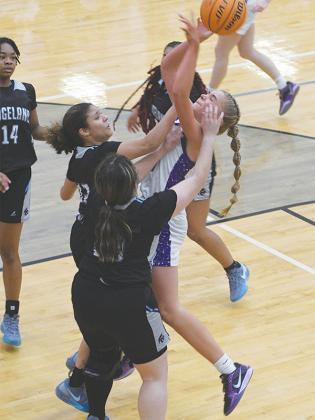 Lady Cat Jace Sanderson draws a foul on her way to 18 points versus Ridgeland.