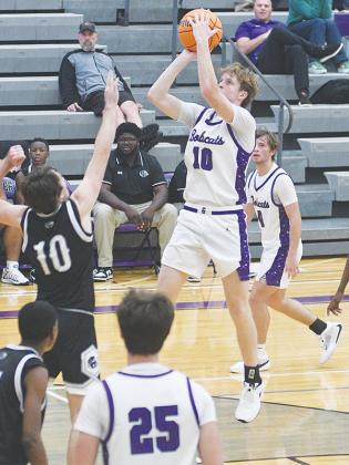 Bobcat senior J.D. Taylor scores two of his 21 points versus Ridgeland last Tuesday.