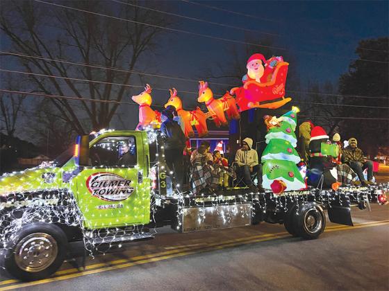 The Commercial Award goes to Gilmer Towing with his Flying Santa and well lit up truck. (Engage in Gilmer photo)