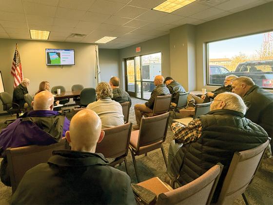 County officials meet at the Gilmer County Airport to hear the latest weather alerts from the National Weather Service. (Photo by Lauren Sabia)