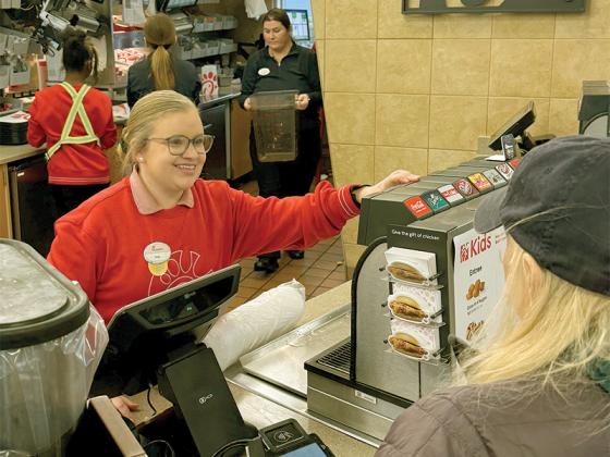 Abby Collins takes an order at the Gilmer County Chick-fil-A. Collins has worked at the restaurant for four years. Chick-fil-A will be closing the doors this week in order to begin renovating the facility and the parking lot. (Photo by Lauren Sabia/Reporter)