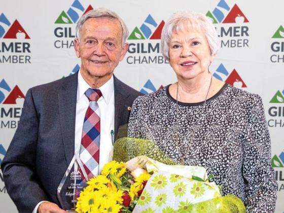 Edgar Land poses with wife, Barbara, after winning Citizen of the Year at the Gilmer Chamber’s annual meeting. (Photo by Carolyn Slavenas, Slavenas Photography)