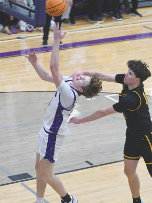 Gilmer senior J.D. Taylor draws a hard foul scoring two of his season-high 46 points last Saturday versus Murphy.