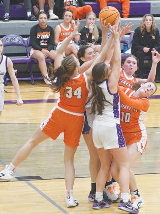 From left, Gilmer’s Chelsey Griggs and Bree Burnette battle for a rebound versus LaFayette.