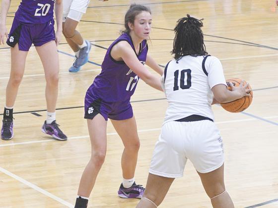 Gilmer senior Madison Bradshaw defends the perimeter last Tuesday and scored 13 points to go with seven rebounds, four assists and two steals in the Lady Cats’ round one win over Stephenson.