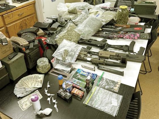Firearms, drugs and cash confiscated from home on Simmons Road by GCSO.