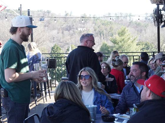 Co-owner Matt Bond greets customers dining at the Roof on Valentine’s Day.