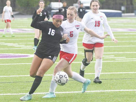 Gilmer’s Yenifer Lopez (left) netted four goals in the Lady Cats’ win over Fannin County last Tuesday.