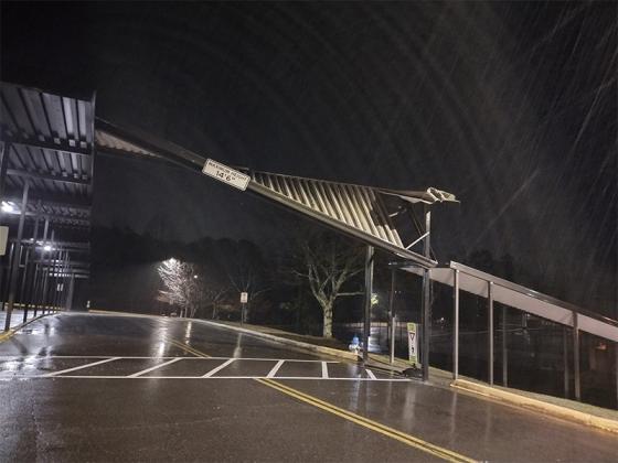 Storms overnight caused an awning at Gilmer High School to bend apart. It has since been removed. (Photo by Mark Millican))