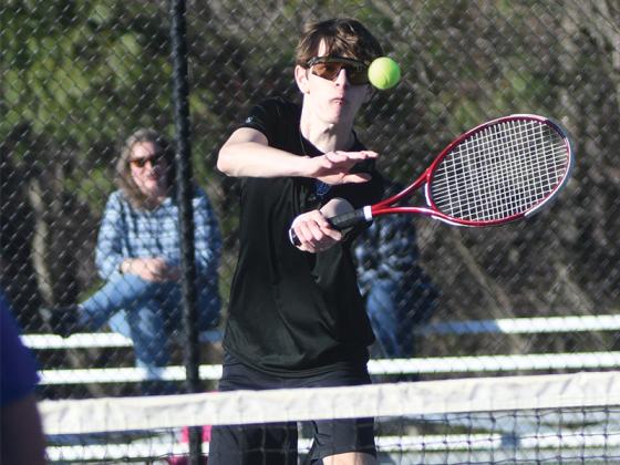 Gilmer High’s David Warren plays a ball at the net and earned the Bobcats’ lone win versus Fannin County last Friday.