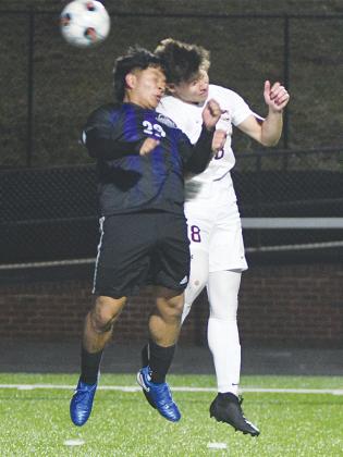 Gilmer High School sophomore Johnnie Resendiz (29) wins a header versus Dawson County last Friday.