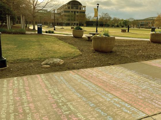 College ministry chalked all 879 verses of the Gospel of John on Kennesaw State University sidewalks.