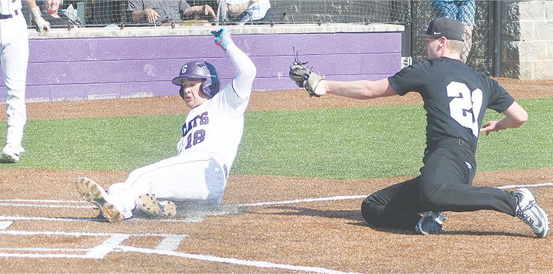 Gilmer sophomore Peyton Chancey (18) slides safely home on a passed ball last Friday against Ridgeland. He ended the series with four hits and drove in eight runs.