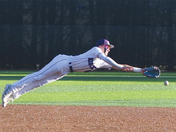 Gilmer senior shortstop Eli Cooper makes a diving stop and recorded four hits last Thursday versus Northwest Whitfield.
