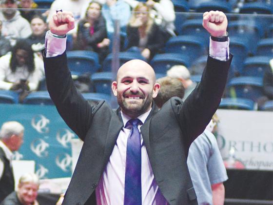 Josh Ghobadpoor celebrates Gilmer clinching the Class 3A traditional state championship in 2022.