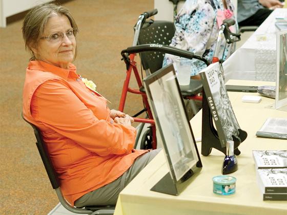 Each local talent had a table displaying their books at the forum, held in the library’s basement community room, that they also could sign for fans. “My book, “Dear Dad,” was the fulfillment of a promise I made to my dad,” author Kathy Williams said about responding to letters he wrote while serving in World War II. “It ended up being a memoir, as well as a historical document.”