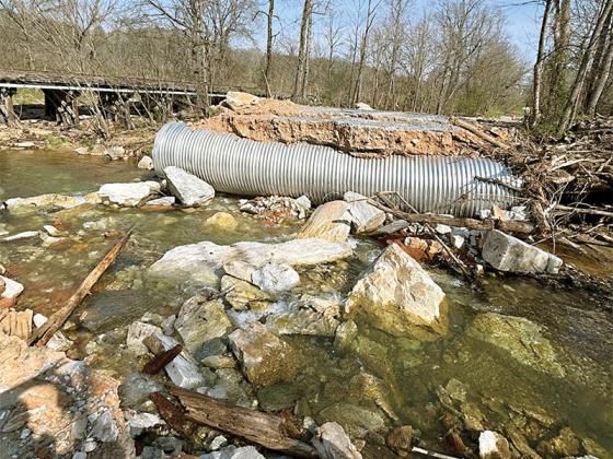 Part of Ravencliff Road washed out. A lack of warning signs caused a Pickens County man to crash his car on March 27. (Courtesy of Gilmer County Sheriff’s Office)