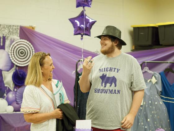 Student Joshua Ayers and teacher Beth Smith enjoy exploring the Bobcat Boutique. 