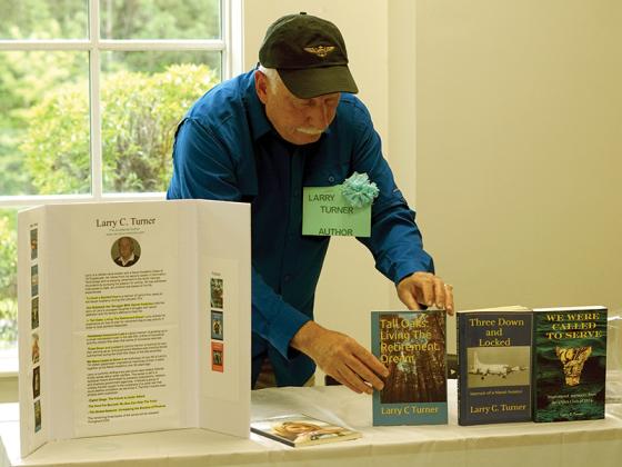 Larry Turner recalled where his literary journey began, leading him to write eight books so far, as well as his purpose. “My goal was not so much to earn royalties, but to leave a legacy to my grandchildren and great-grandchildren of what their grandfather had done during his life,” Turner said. “That he was more than the goat and chicken farmer from Ellijay, Georgia, they had come to know.”