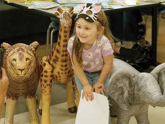 Gilmer County Schools hosted Family Literacy Night May 2. This year’s theme was “wild about books,” taking families on a safari adventure. Photographed is pre-K student Delilah Collier.