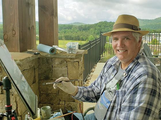 Artist Joseph Basco painting at a previous Plein Air. He’s teaching a workshop at this year’s event.