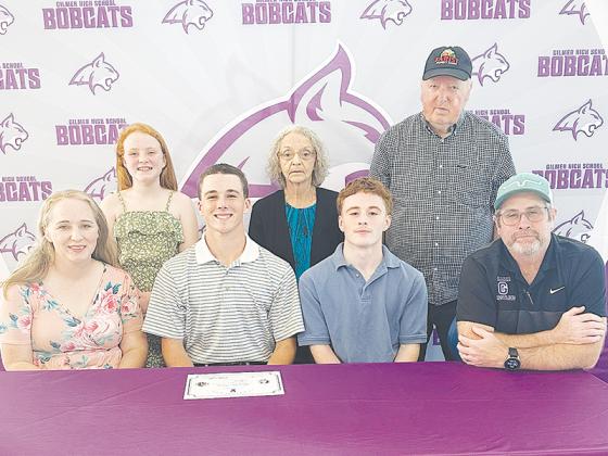 Gilmer High’s Hayden Berry, second from left, will attend Brewton-Parker College and play baseball for the Barons. He is joined by mom Monica Berry, brother Bregan Berry and dad Brent Berry. Standing from left are, sister Garrett Berry and grandparents Janie and Emmett Farist.