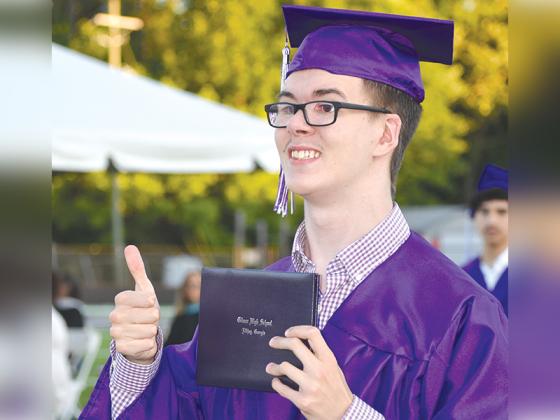 Braxton Burrell give a thumbs up after receiving his diploma at the Gilmer High School commencement ceremony held Friday, May 23, at Huff-Mosley Memorial Stadium. 