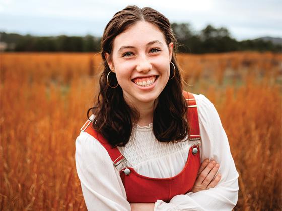 Clare Moore, age 17, has a passion for farming and natural living. Her endeavors include baking sourdough bread, raising chickens, gardening and making her own beauty care products. She also seeks to inspire other young people on her YouTube channel, “Sustaining Food for Thought.” 
