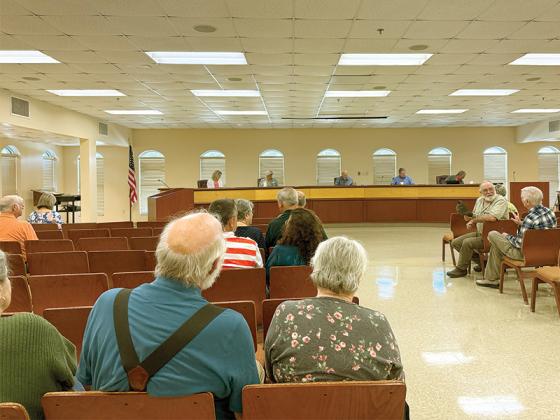 Gilmer County commissioners hear comments from the public at their meeting May 8 in the Courthouse Jury Assembly Room. 