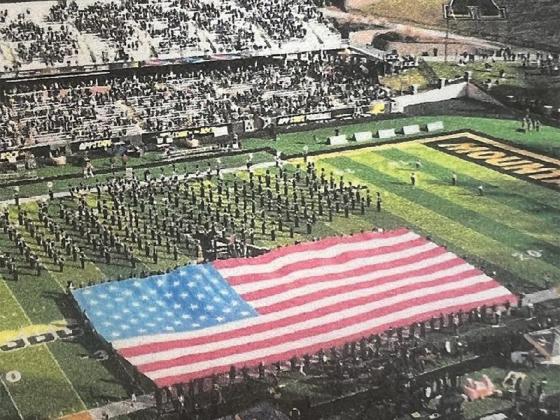A flag similar to this one will be held up by around three dozen volunteers on Ellijay Flag Day, Saturday, June 14, at the Lions Club Fairgrounds. Volunteers, who must be 15 years old, should arrive by 9 a.m. 