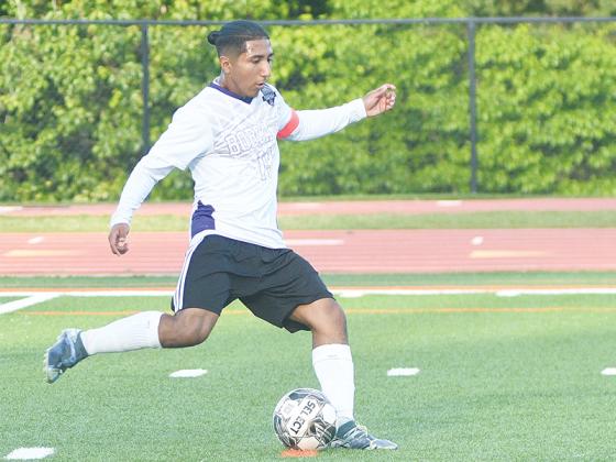 Gilmer senior captain Jorge Flores scores the Bobcats’ goal on a penalty kick versus Northwest Whitfield in the Elite Eight of the state soccer playoffs last Tuesday.