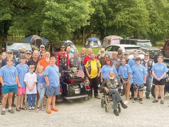 The whole gang at American Legion Family Junior Leadership Camp includes local leaders Brian and Melissa Shedd, Brian Schmidt, Richard Stanley and his son, junior counselor Vincent Stanley and those from other posts in Georgia: George Gray, Lexington; Mark Hines, Douglasville; junior counselor Willa Payton, Meansville; Ronnie Grist, Rome; Cliff and Susan Hall, Lakeland; and Dennis Fitzgerald, Midway. Here, camp leaders and youth are pictured with the American Legion Riders who took the kids to lunch on thei