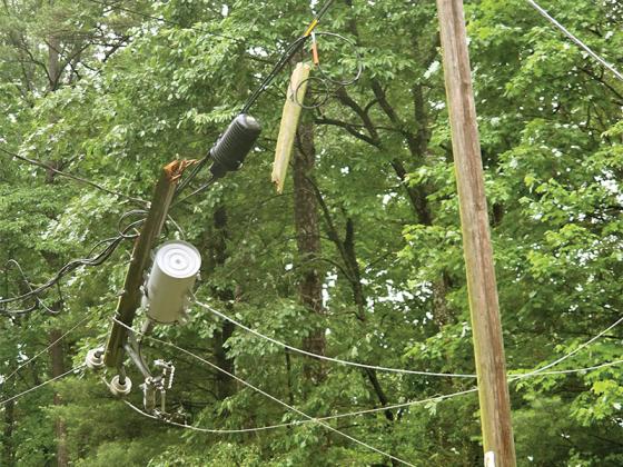 Emergency Management officials believe a possible straight line wind event caused problems in Gilmer County June 7, Downed trees and power poles left 6,800 without power.