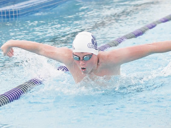 The Gilmer Swim Team was in Lumpkin County last Thursday for its third meet of the season. Reece Smith competes in the butterfly.