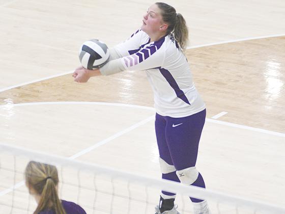 Gilmer High honor graduate Maddie Usry keeps a rally alive during her senior season with the Lady Cats.